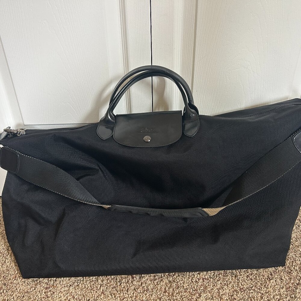 Longchamp Black Duffel Bag with Lock and Removable Shoulder Strap